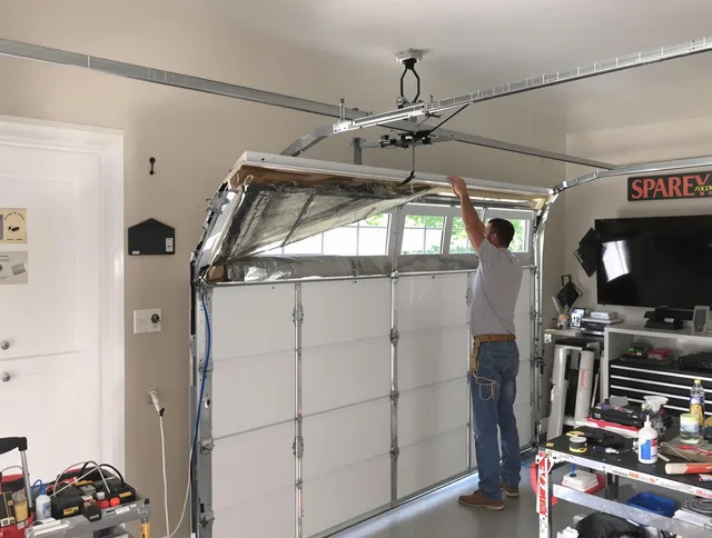 Garage door section replacement by North Olmsted Garage Door Repair in North Olmsted