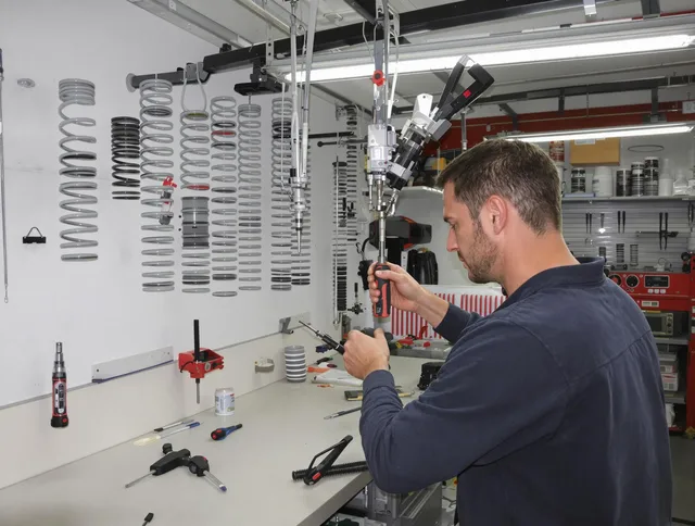North Olmsted Garage Door Repair safety certified technician performing precision spring replacement in North Olmsted