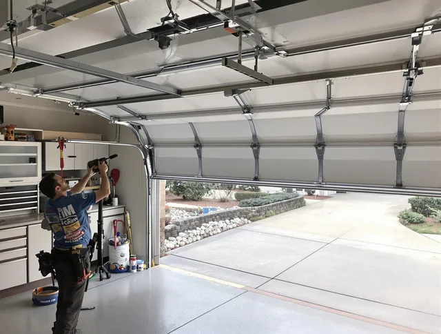 Garage door track repair service by North Olmsted Garage Door Repair in North Olmsted